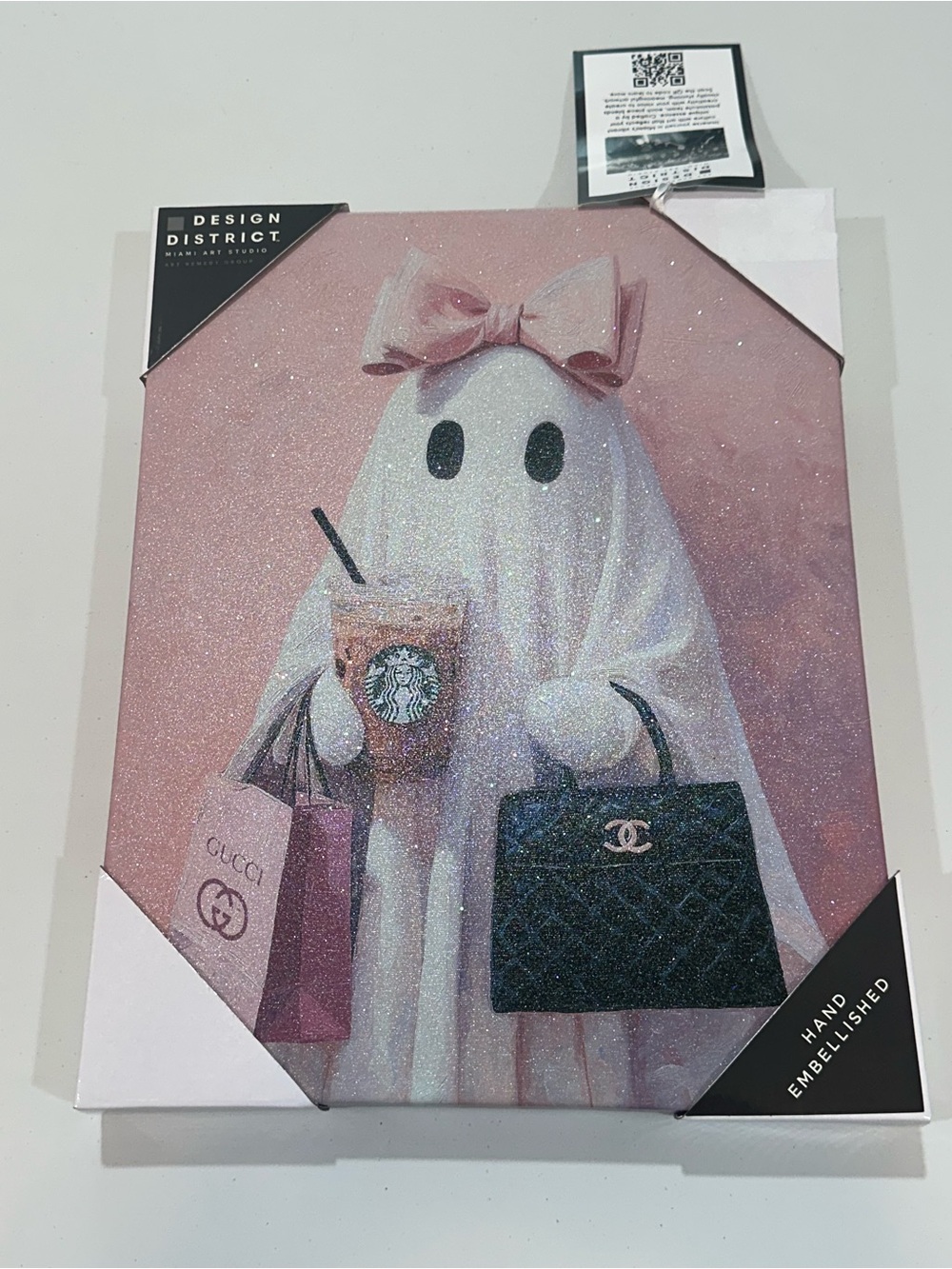 Viral Ghost Wall Art with pink bow coffee and purse